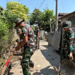 Satgas TMMD ke-129 Bersama Warga Gelar Kerja Bakti Bersihkan Lokasi Sasaran 4