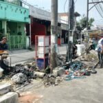 Antisipasi Musim Penghujan,Kepala Desa Karangasih Bersama Aparatur Desa Gelar Kerja Bakti Bersihkan Saluran Air